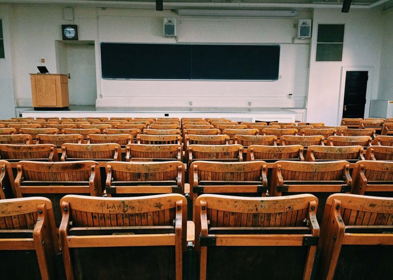 rows of seats in an auditorium classroom
